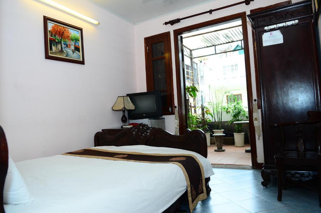 Sweet Family Guest House Ханой Стая снимка